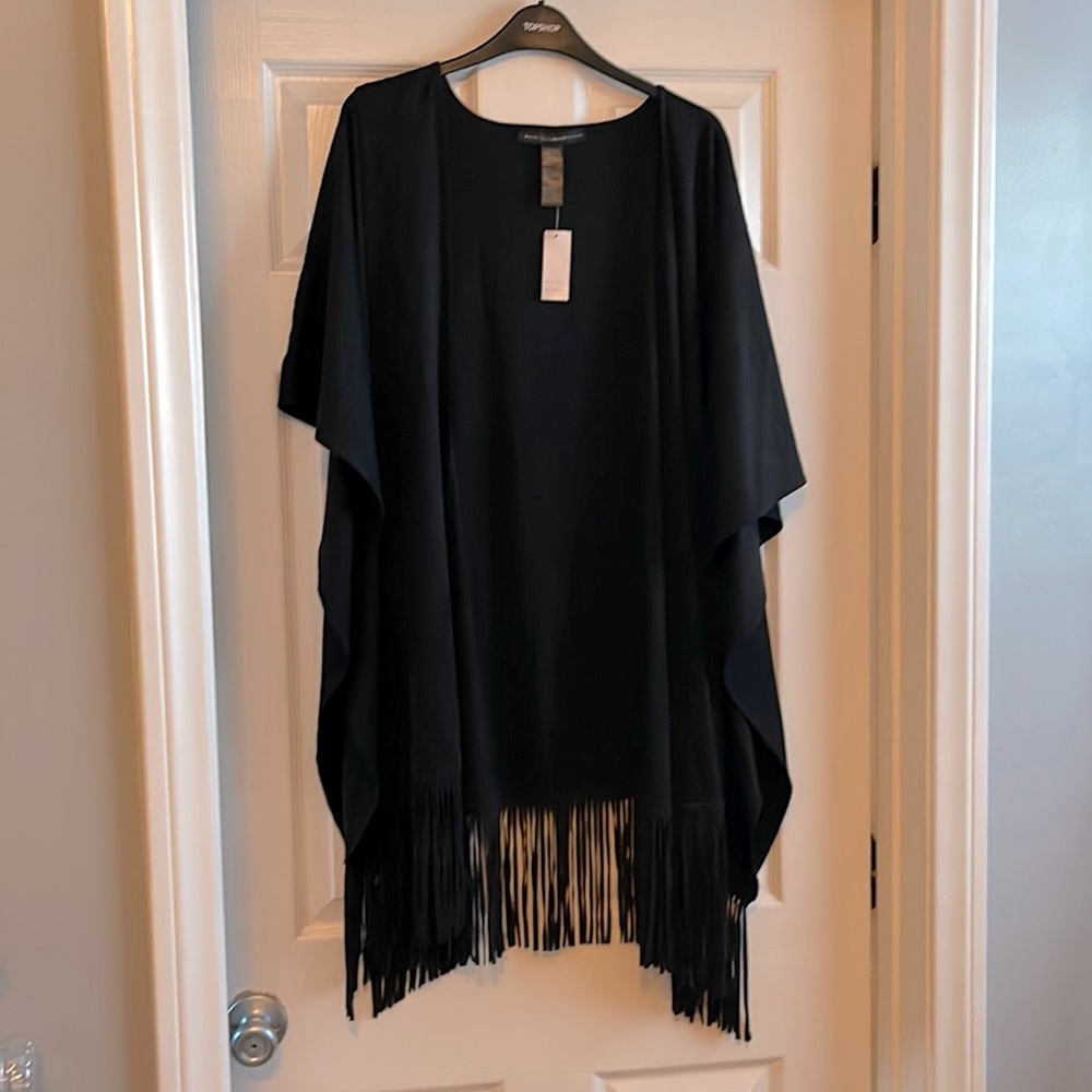 Brand New. White House Black Market Faux Suede Fringe Cape in Black. Never Worn.